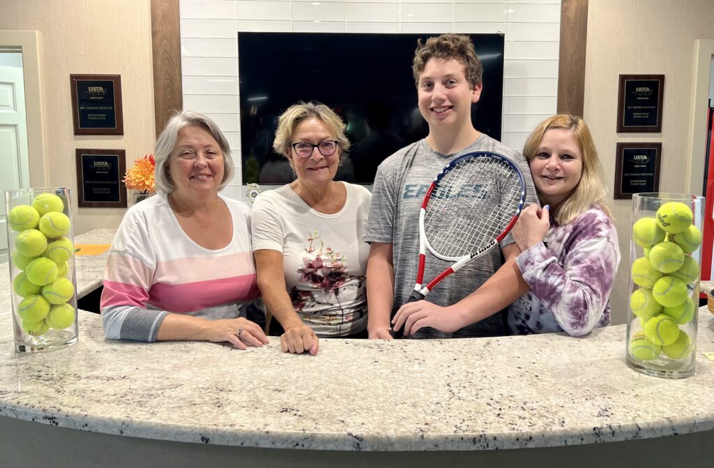 Pictured above (l to r) Karen Mullaney and Lisbet Christiansen, board members, Shawn and Jill, Shawn’s mother